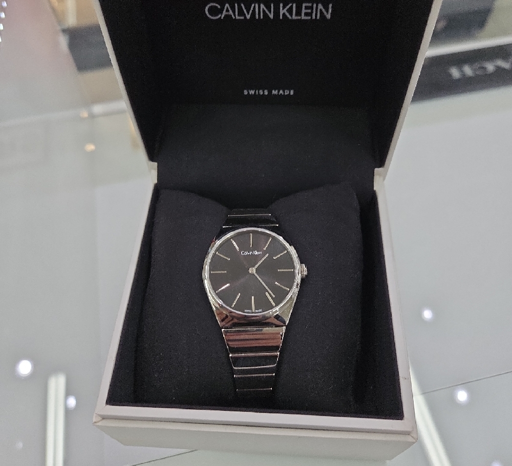 Calvin Klein Black and Silver Watch